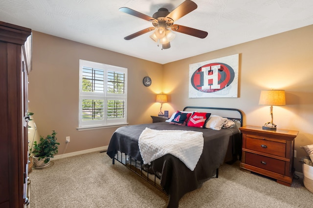 1002 S Joshua Ave, Republic, MO 65738 - bedroom with light carpet, baseboards, and ceiling fan