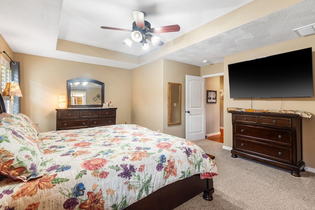 1002 S Joshua Ave, Republic, MO 65738 - bedroom featuring light carpet, a raised ceiling, baseboards, and ceiling fan