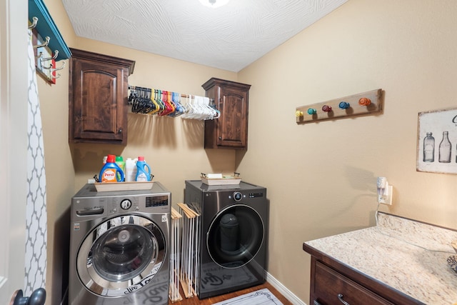 1002 S Joshua Ave, Republic, MO 65738 - laundry room with cabinet space, separate washer and dryer, wood finished floors, and baseboards