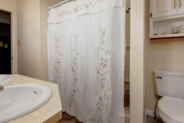2812 W Lombard St, Springfield, MO 65802 - full bathroom featuring toilet, shower / tub combo with curtain, and vanity