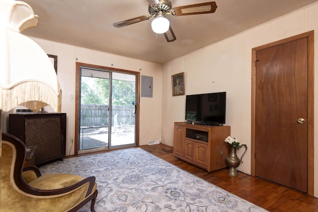 2812 W Lombard St, Springfield, MO 65802 - living room with electric panel, a ceiling fan, and wood finished floors