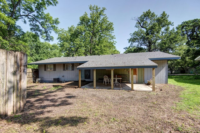2812 W Lombard St, Springfield, MO 65802 - back of house with a patio, central air condition unit, and roof with shingles