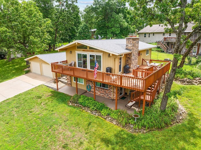 25630 Foxwood Cir, Shell Knob, MO 65747 - back of property with a wooden deck, stairway, a lawn, and an outdoor structure