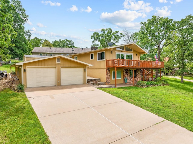 25630 Foxwood Cir, Shell Knob, MO 65747 - view of front facade with stone siding, a deck, a front lawn, stairway, and a detached garage