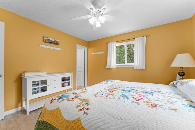 25630 Foxwood Cir, Shell Knob, MO 65747 - bedroom featuring ceiling fan, baseboards, and light carpet