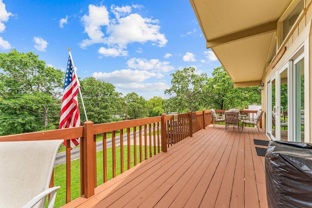 25630 Foxwood Cir, Shell Knob, MO 65747 - wooden deck with outdoor dining area and a lawn