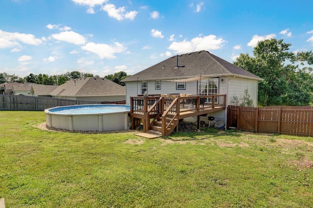 803 W Ridgecrest St, Ozark, MO 65721 - back of property with a deck and a shingled roof