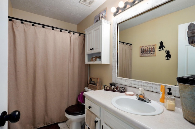803 W Ridgecrest St, Ozark, MO 65721 - bathroom with toilet, vanity, a textured ceiling, tile patterned flooring, and a shower with shower curtain