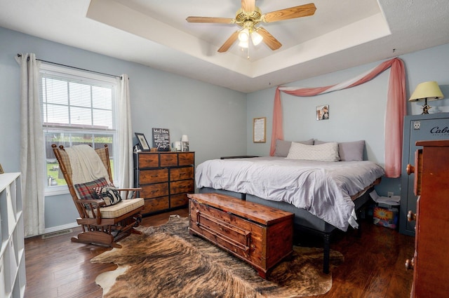 803 W Ridgecrest St, Ozark, MO 65721 - bedroom with a raised ceiling, wood finished floors, multiple windows, and ceiling fan