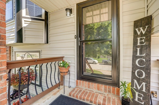 803 W Ridgecrest St, Ozark, MO 65721 - doorway to property featuring a porch