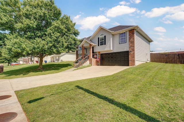 803 W Ridgecrest St, Ozark, MO 65721 - view of front of home featuring an attached garage, brick siding, and concrete driveway