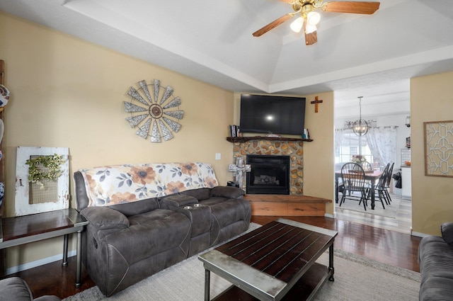 803 W Ridgecrest St, Ozark, MO 65721 - living room featuring wood finished floors, ceiling fan, baseboards, a stone fireplace, and a chandelier
