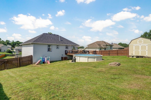 803 W Ridgecrest St, Ozark, MO 65721 - rear view of house featuring a wooden deck and a shingled roof