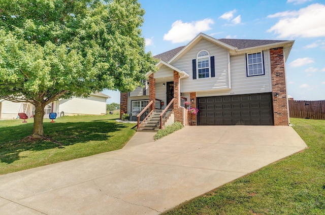 803 W Ridgecrest St, Ozark, MO 65721 - view of front of property with brick siding, an attached garage, concrete driveway, a porch, and a shingled roof