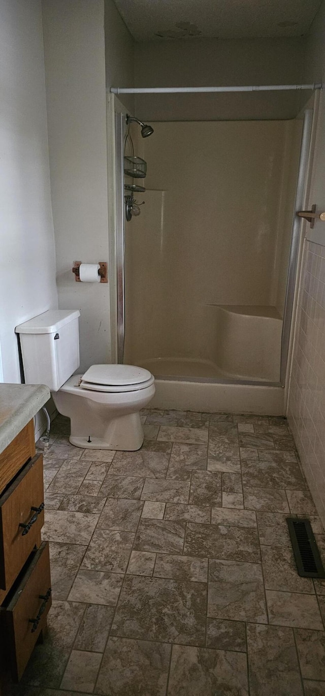 2211 Joanne- Dr, West Plains, MO 65775 - full bathroom featuring toilet, a shower stall, and vanity