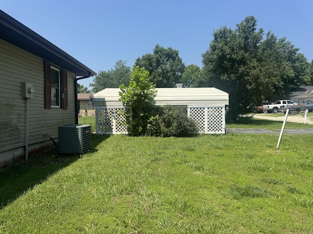 17 Sherwood Trl, Buffalo, MO 65622 - view of grassy yard with central AC unit