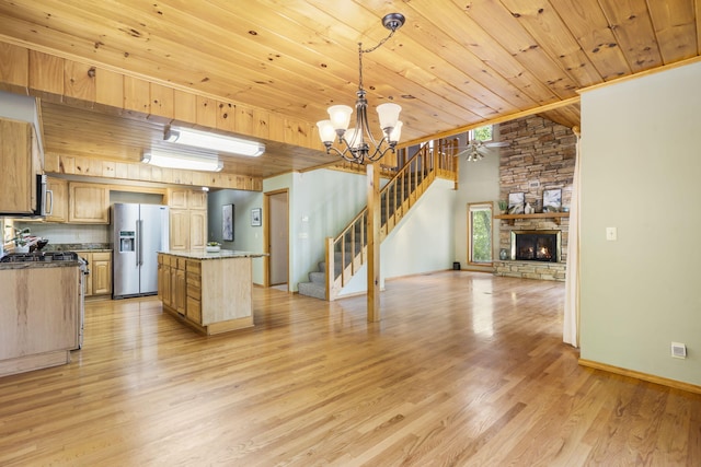 26517 Farm Rd Unit 1212, Eagle Rock, MO 65641 - kitchen featuring stainless steel appliances, wooden ceiling, open floor plan, light wood finished floors, and a chandelier
