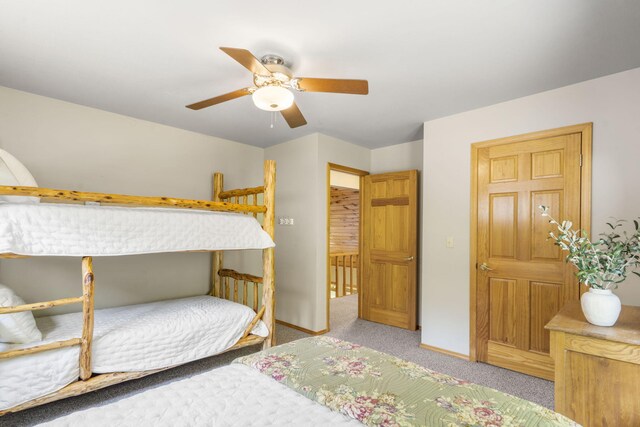 26517 Farm Rd Unit 1212, Eagle Rock, MO 65641 - bedroom with carpet flooring, ceiling fan, and baseboards
