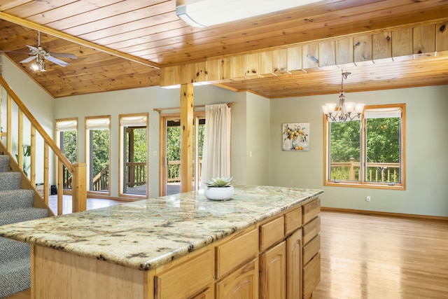 26517 Farm Rd Unit 1212, Eagle Rock, MO 65641 - kitchen featuring plenty of natural light, wood ceiling, light wood-style floors, a chandelier, and a kitchen island