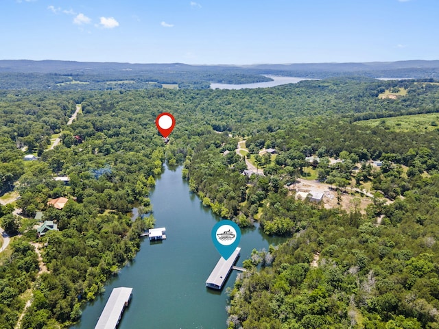 26517 Farm Rd Unit 1212, Eagle Rock, MO 65641 - bird's eye view of a heavily wooded area and a nearby body of water
