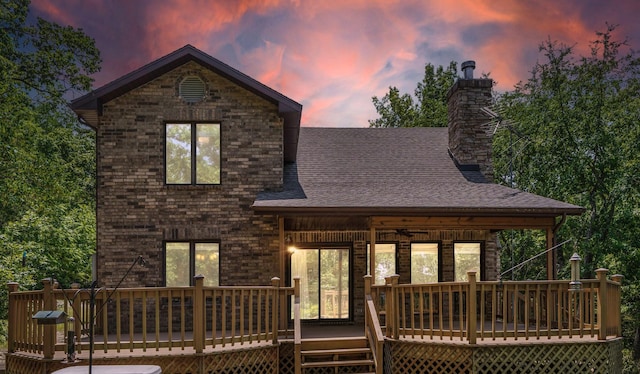 26517 Farm Rd Unit 1212, Eagle Rock, MO 65641 - back of house featuring a wooden deck, a chimney, a shingled roof, and ceiling fan