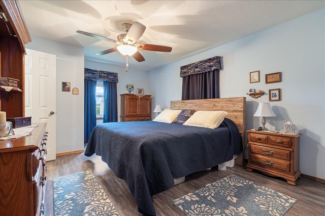 1900 State Highway 76, Anderson, MO 64831 - bedroom with wood finished floors, baseboards, and ceiling fan