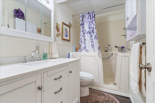 1900 State Highway 76, Anderson, MO 64831 - bathroom with vanity, toilet, and wood finished floors