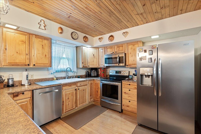 1900 State Highway 76, Anderson, MO 64831 - kitchen with appliances with stainless steel finishes, a sink, wood ceiling, light wood finished floors, and light countertops