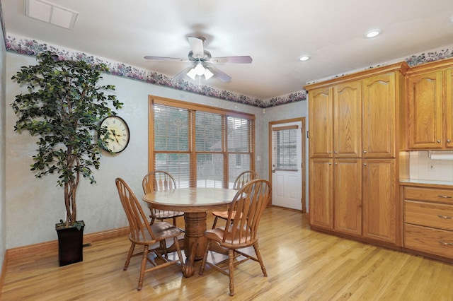 2411 W Dearborn St, Springfield, MO 65807 - dining area featuring light wood-type flooring, ceiling fan, and recessed lighting
