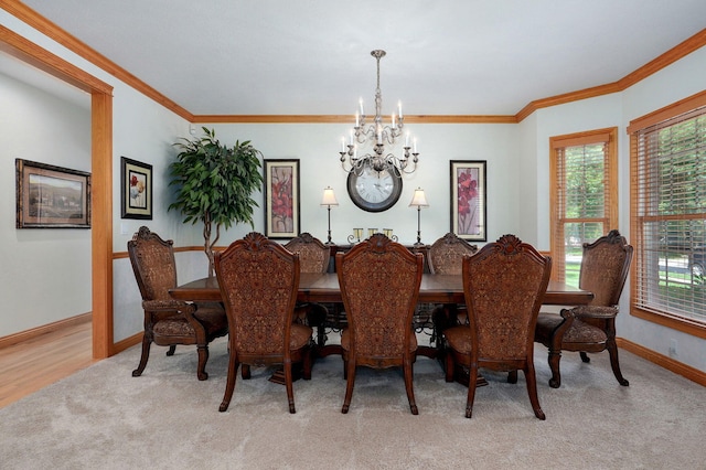 2411 W Dearborn St, Springfield, MO 65807 - carpeted dining room with a chandelier and ornamental molding