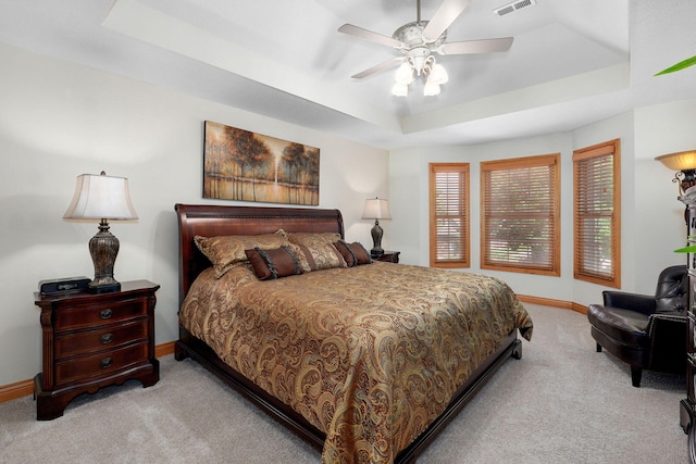 2411 W Dearborn St, Springfield, MO 65807 - bedroom featuring a raised ceiling, carpet flooring, and ceiling fan