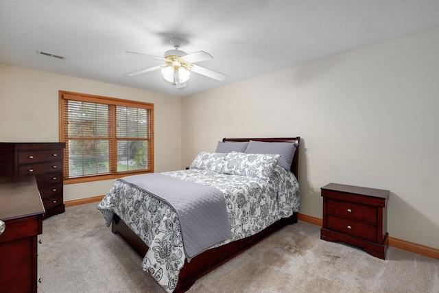 2411 W Dearborn St, Springfield, MO 65807 - carpeted bedroom with baseboards and ceiling fan