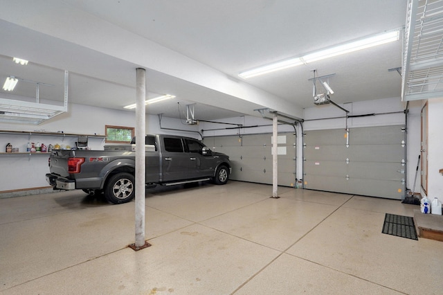2411 W Dearborn St, Springfield, MO 65807 - garage with a garage door opener