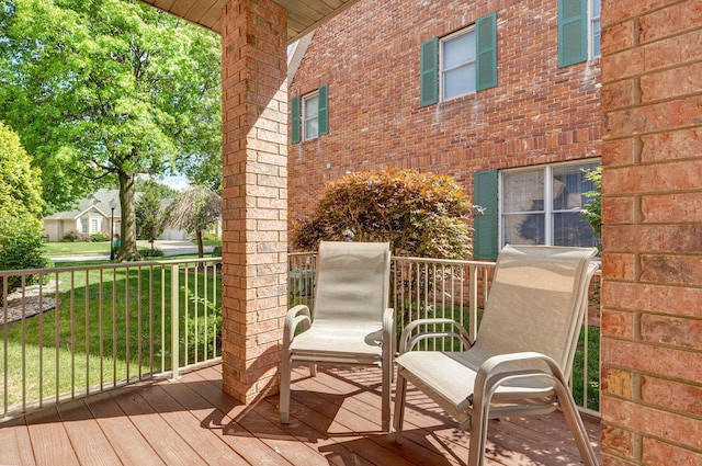 2411 W Dearborn St, Springfield, MO 65807 - wooden porch with a lawn