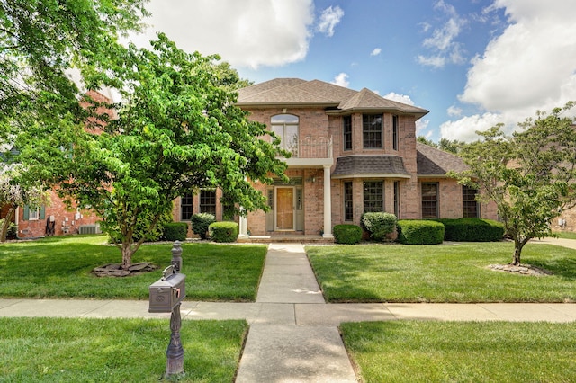2411 W Dearborn St, Springfield, MO 65807 - view of front of property featuring brick siding, a shingled roof, and a front lawn
