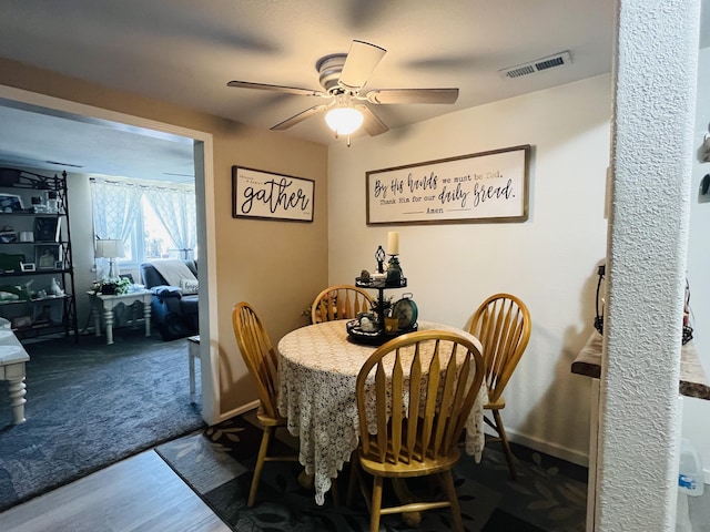 720 Highland St, Cabool, MO 65689 - dining area featuring ceiling fan and wood finished floors