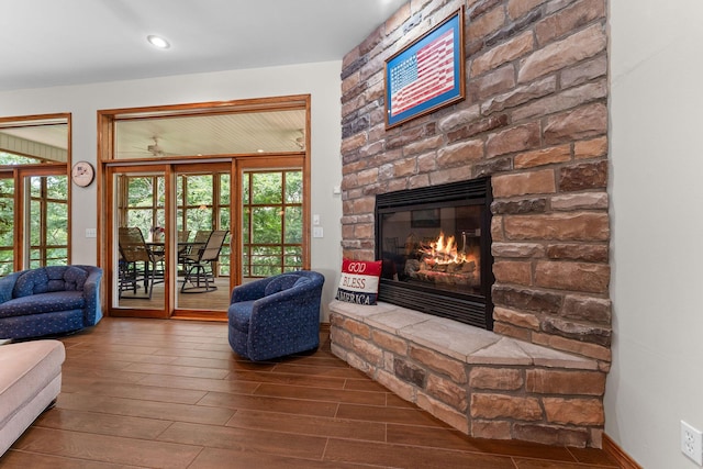 159 Oak Tree Point Ln, Shell Knob, MO 65747 - living area with wood finished floors, a stone fireplace, and recessed lighting