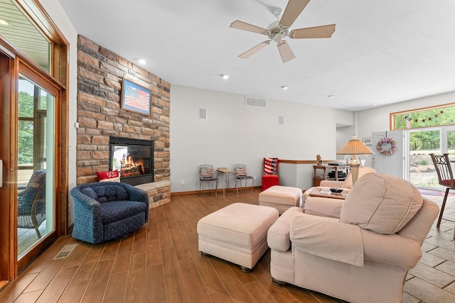 159 Oak Tree Point Ln, Shell Knob, MO 65747 - living area with wood finished floors, a fireplace, a ceiling fan, recessed lighting, and baseboards