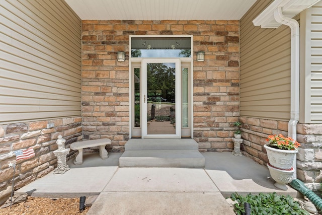 159 Oak Tree Point Ln, Shell Knob, MO 65747 - view of exterior entry with covered porch and brick siding