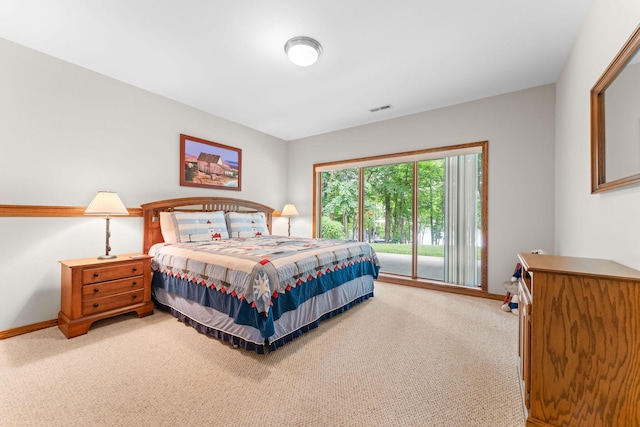 159 Oak Tree Point Ln, Shell Knob, MO 65747 - bedroom featuring light colored carpet, access to exterior, and baseboards