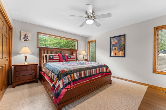 159 Oak Tree Point Ln, Shell Knob, MO 65747 - bedroom with baseboards, light wood finished floors, and ceiling fan