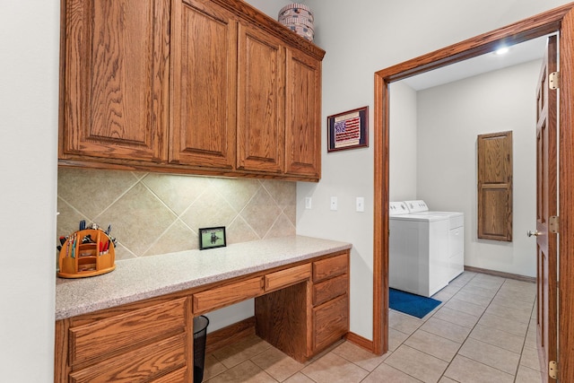 159 Oak Tree Point Ln, Shell Knob, MO 65747 - kitchen with brown cabinetry, tasteful backsplash, independent washer and dryer, and light tile patterned floors