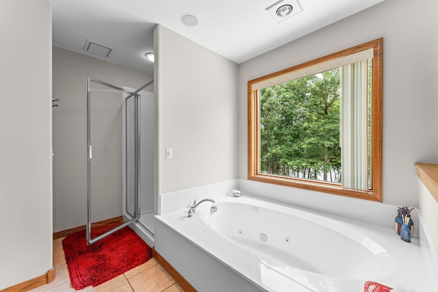 159 Oak Tree Point Ln, Shell Knob, MO 65747 - full bathroom featuring a stall shower, a jetted tub, and tile patterned floors