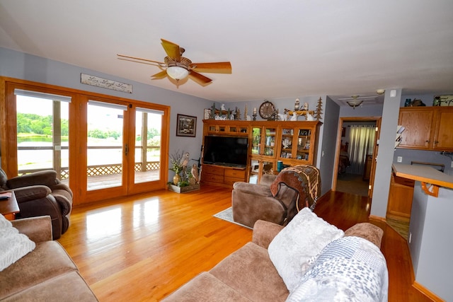 22920 Feaster Branch Rd, Warsaw, MO 65355 - living room with a ceiling fan and light wood finished floors