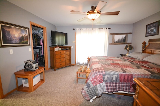22920 Feaster Branch Rd, Warsaw, MO 65355 - bedroom with light carpet, a closet, a spacious closet, a ceiling fan, and baseboards