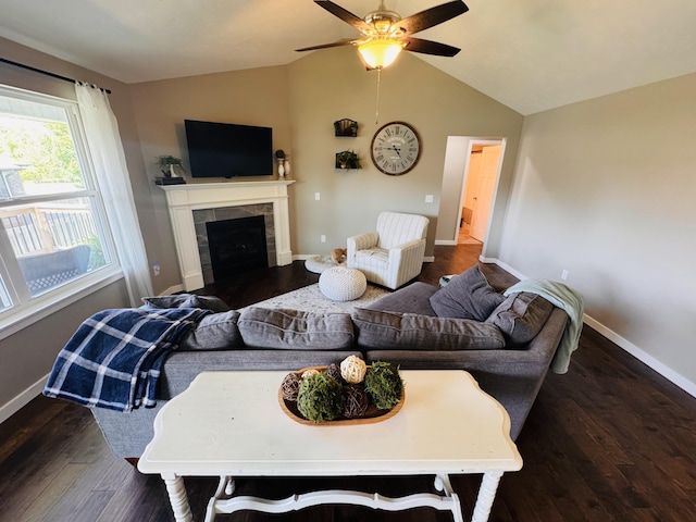 607 E Selby Dr, Nixa, MO 65714 - living room with lofted ceiling, wood finished floors, a ceiling fan, and a fireplace
