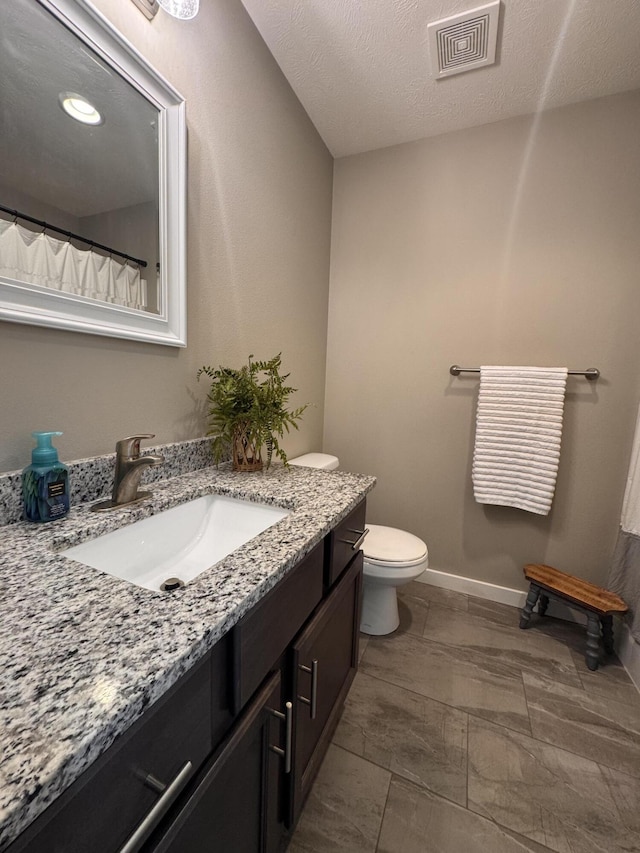 607 E Selby Dr, Nixa, MO 65714 - full bathroom featuring vanity and toilet