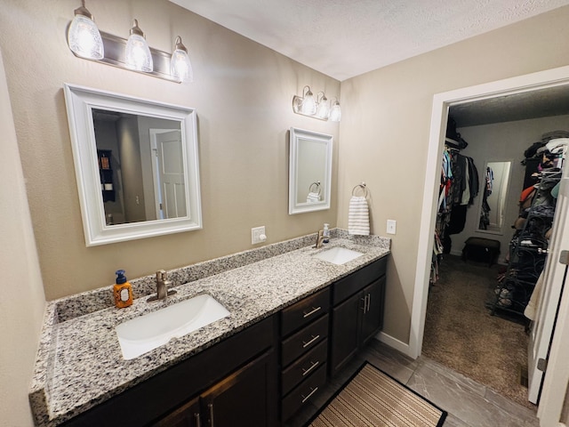 607 E Selby Dr, Nixa, MO 65714 - full bath featuring double vanity and a spacious closet