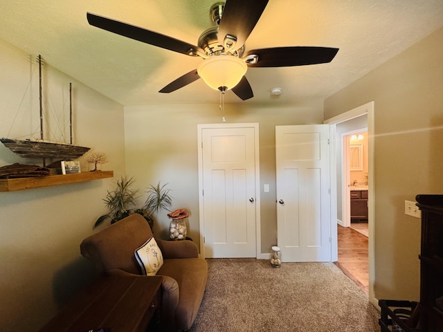 607 E Selby Dr, Nixa, MO 65714 - living area featuring carpet floors and ceiling fan