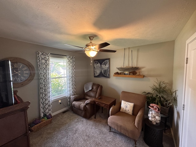 607 E Selby Dr, Nixa, MO 65714 - sitting room featuring carpet flooring, a textured ceiling, and a ceiling fan